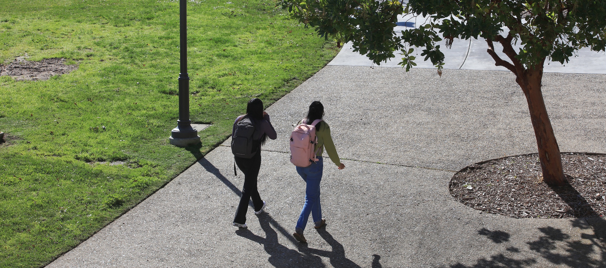 Two students walking outside on MPC Campus