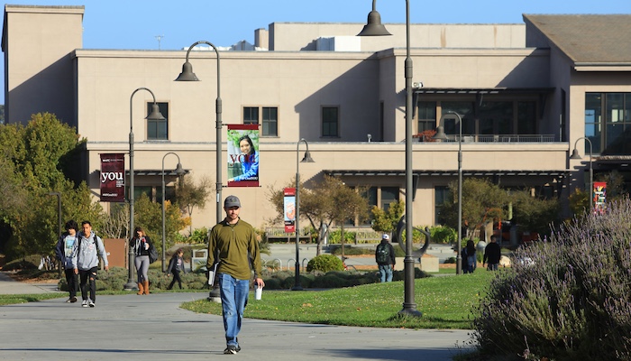 Student walking outside MPC Monterey Campus