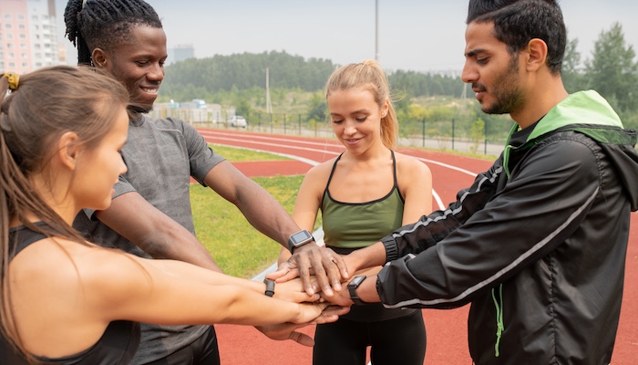 Athletes in a Huddle