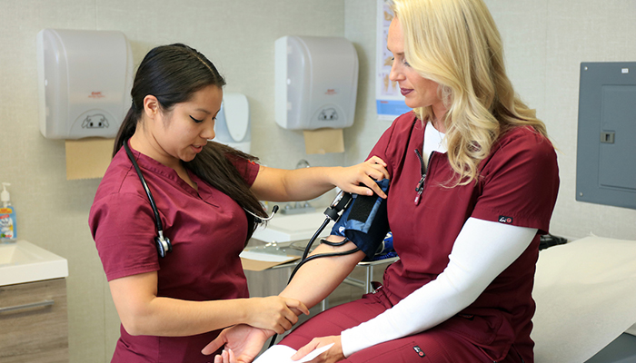 MPC Medical Assisting Students practice skills in class