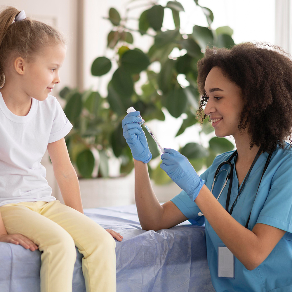 Health Professional administering a shot to a child