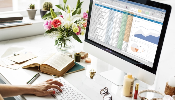 woman using microsoft office on computer