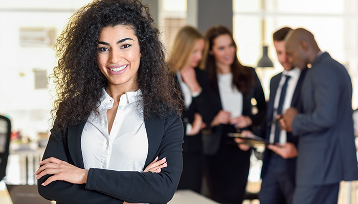 Confident business woman in office environment