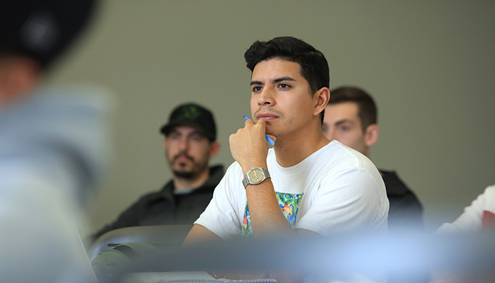 MPC Business student listens attentively during class