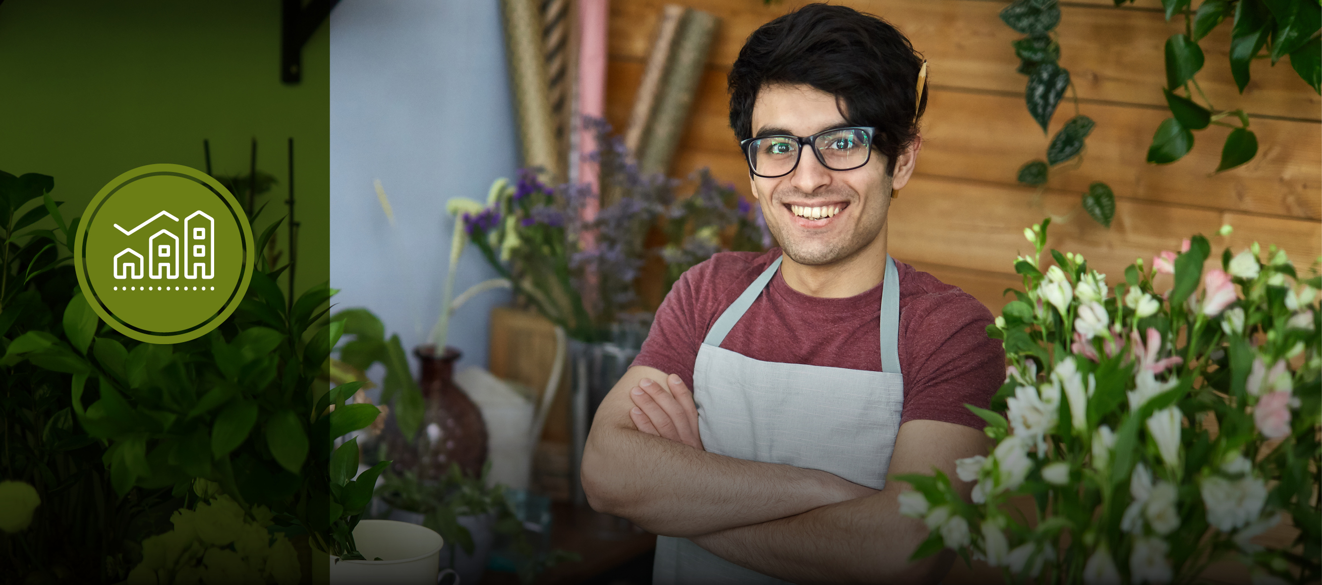 small business owner standing proudly in their shop