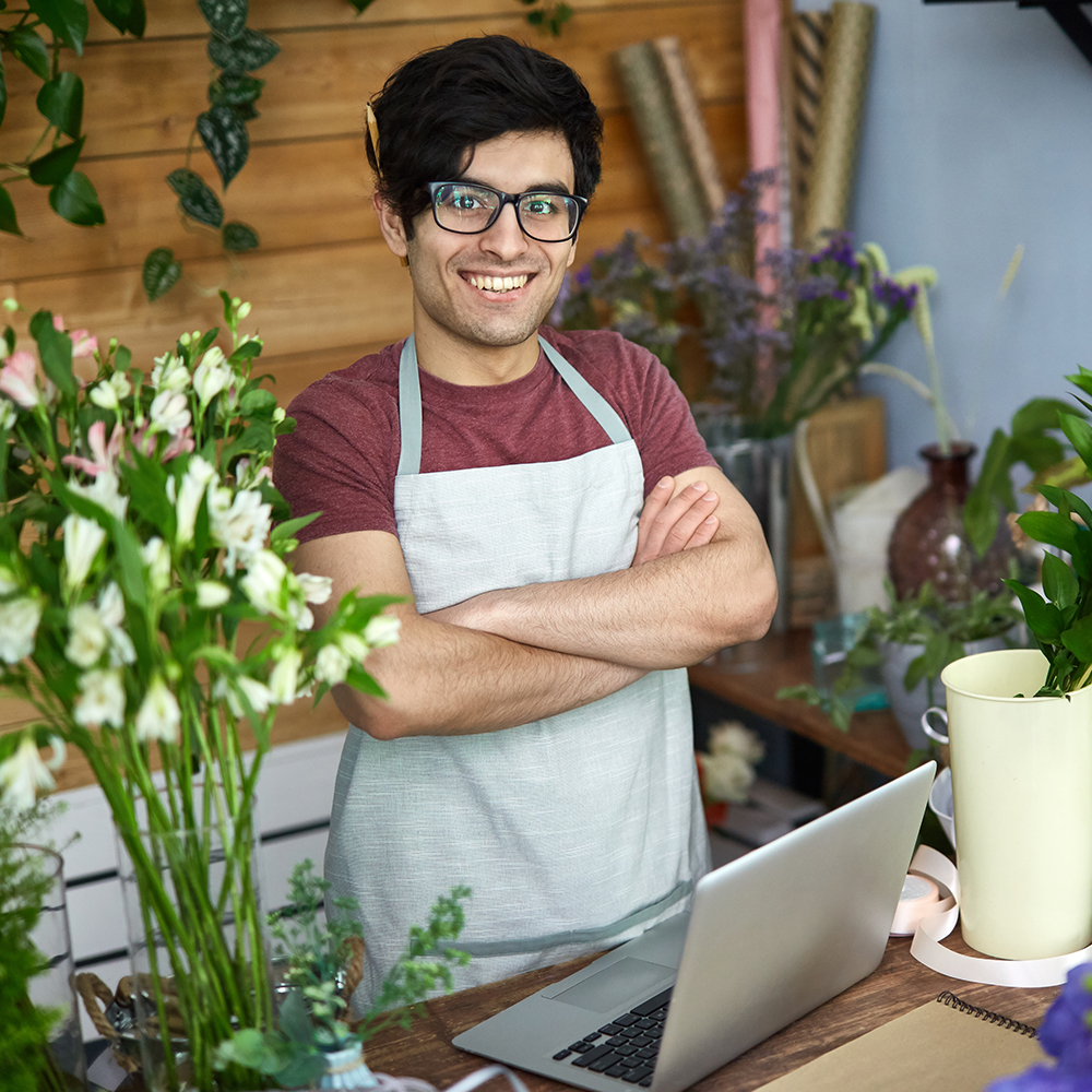 successful small business owner in flower shop