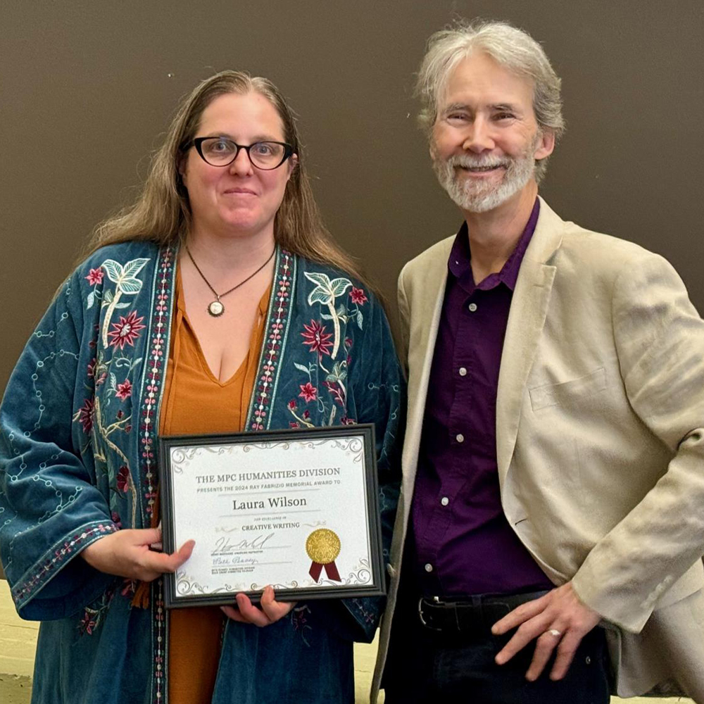 Laura Wilson pictured with Henry Marchand at the Spring 2024 Book Award Ceremony