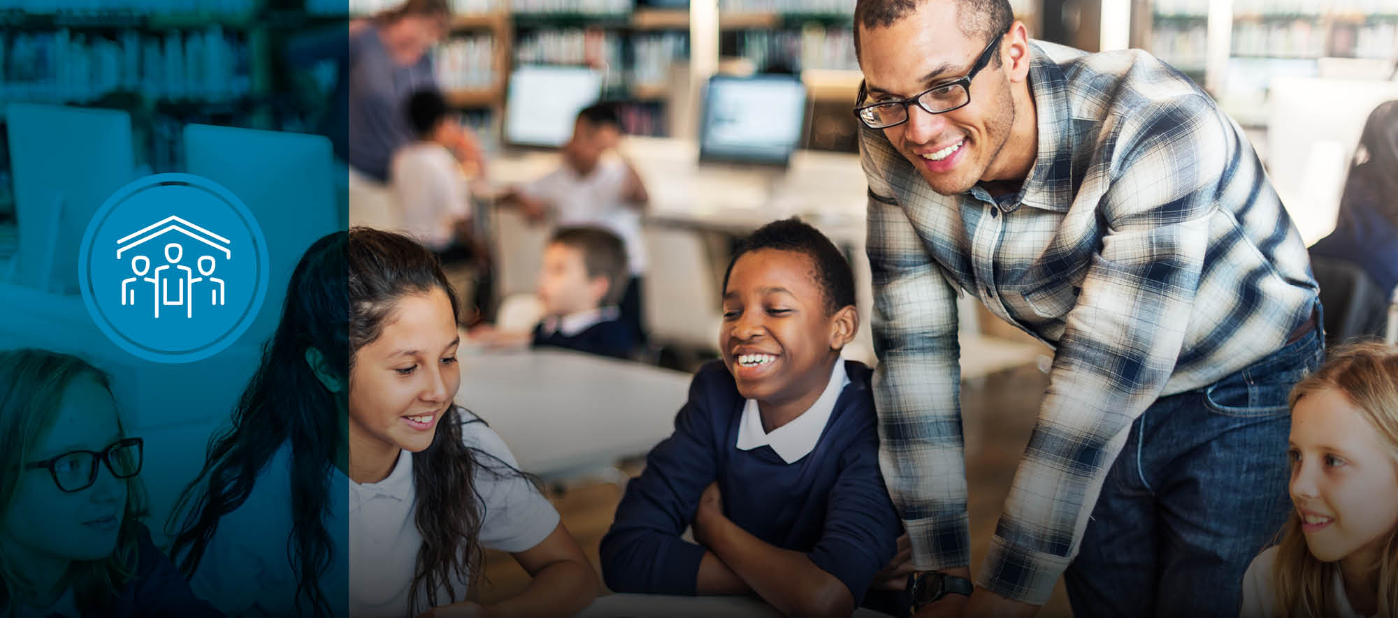 Elementary Teacher Working with Students in Class