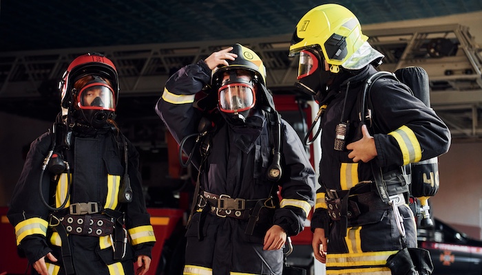 Three Firefighters in Protection Gear