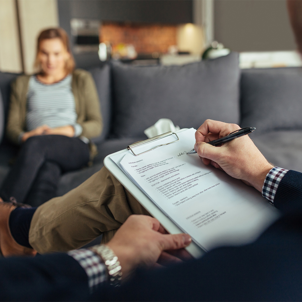 Psychologist works with patient