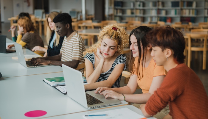 Computer Science Students Working on Laptop Together