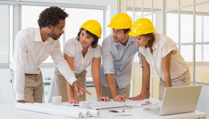 Group of Civil Engineers Looking at Blueprints