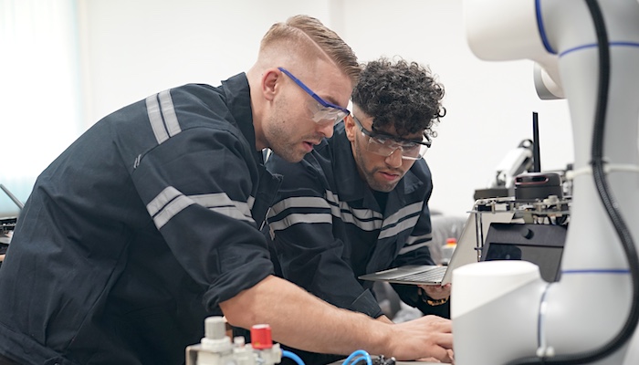 Two Electrical Engineers Working Together