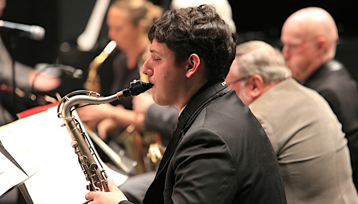 Saxophonist in MPC Concert Band Performing at End of Semester Concert