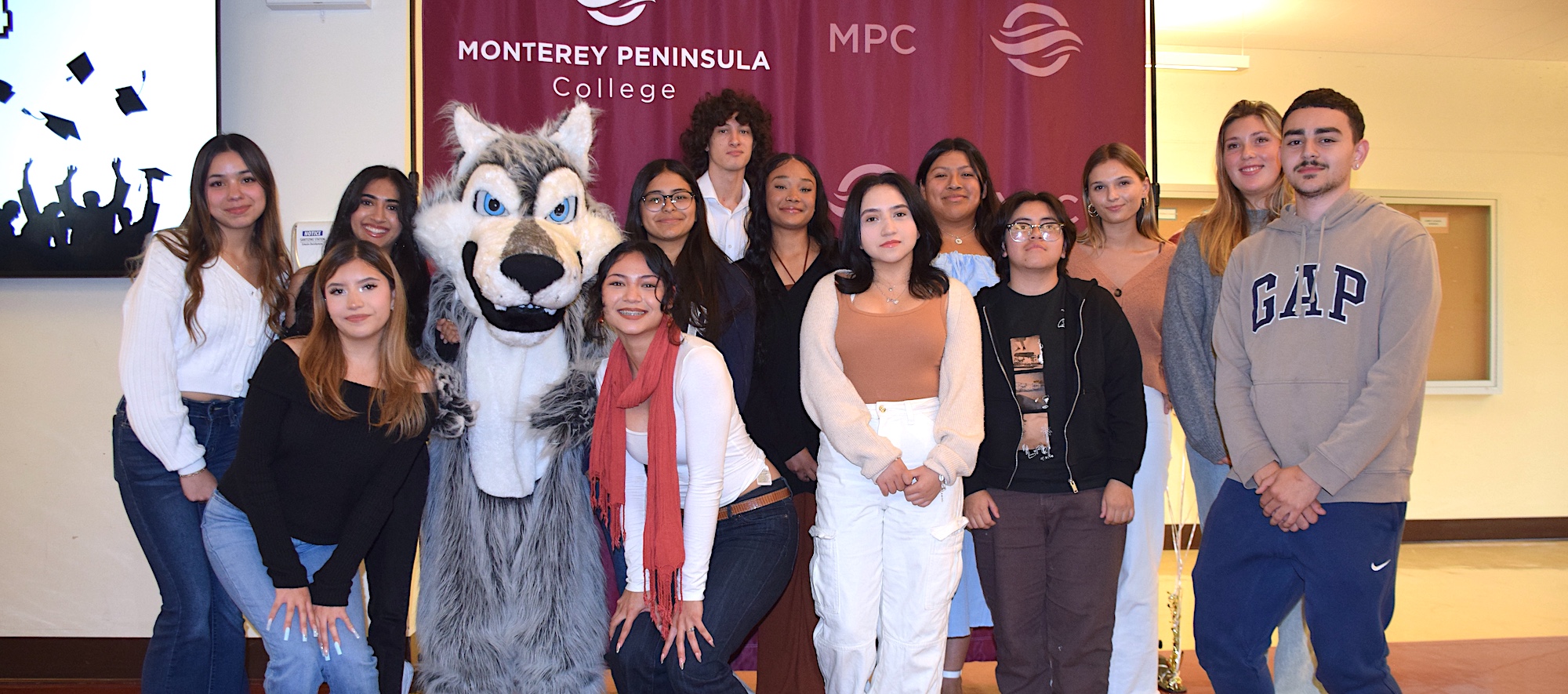 Dual Enrollment Students Posing for Group Photo with Louie the Lobo