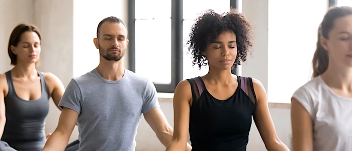 People Doing Yoga Together