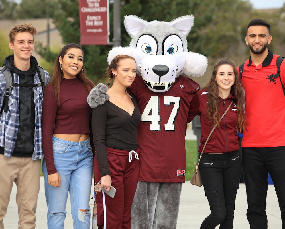 Louie the Lobo Posing with Students