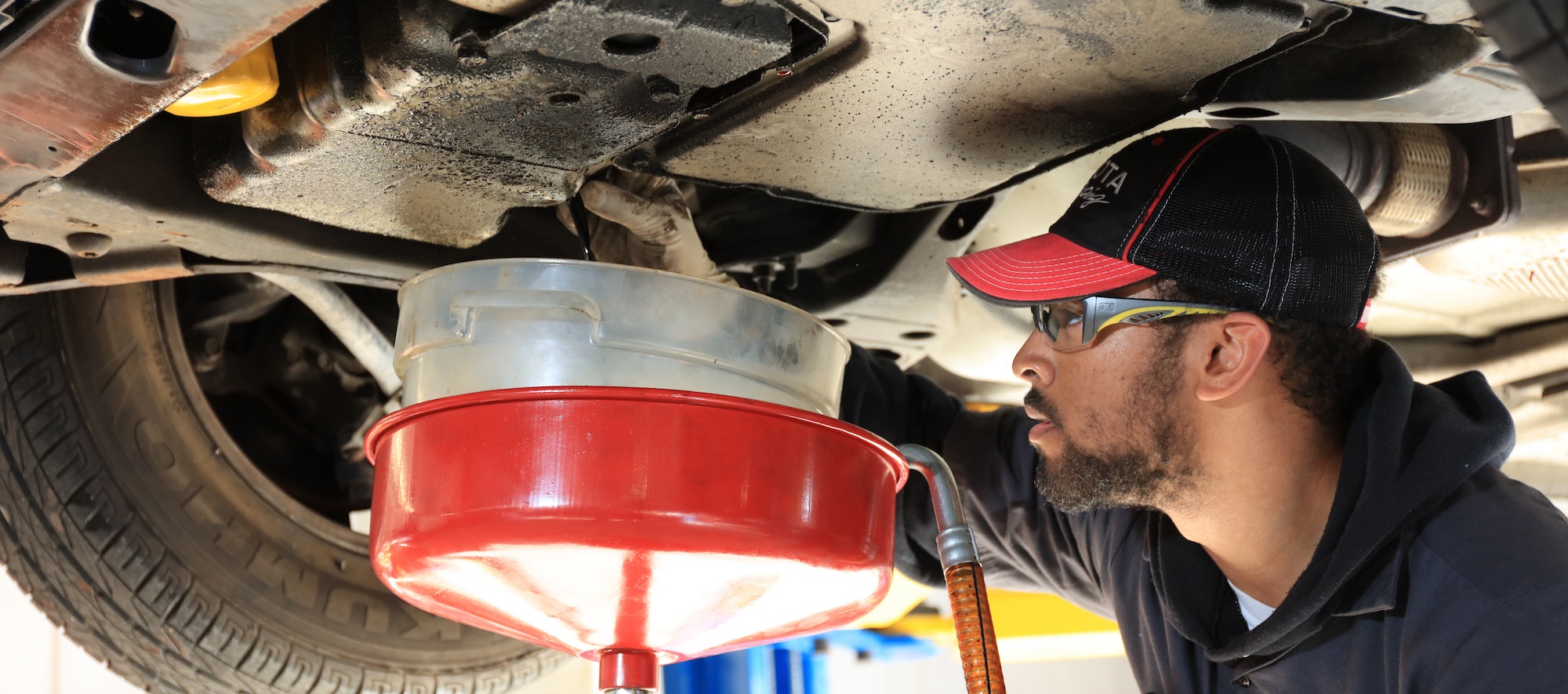 MPC Student Replacing Car Engine Oil in Auto Tech Skills Lab