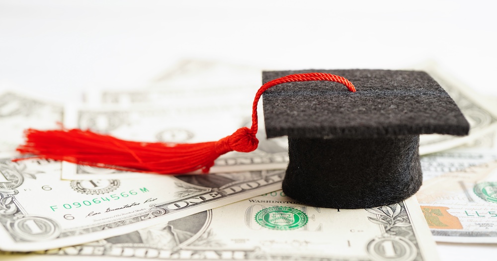 Graduation Cap on Stacks of Quarters