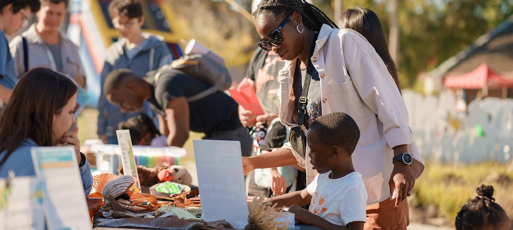 Child with Parent Participating in Family STEM Day