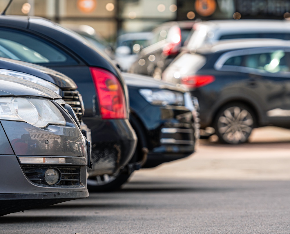 Row of Parked Cars in Parking Lot