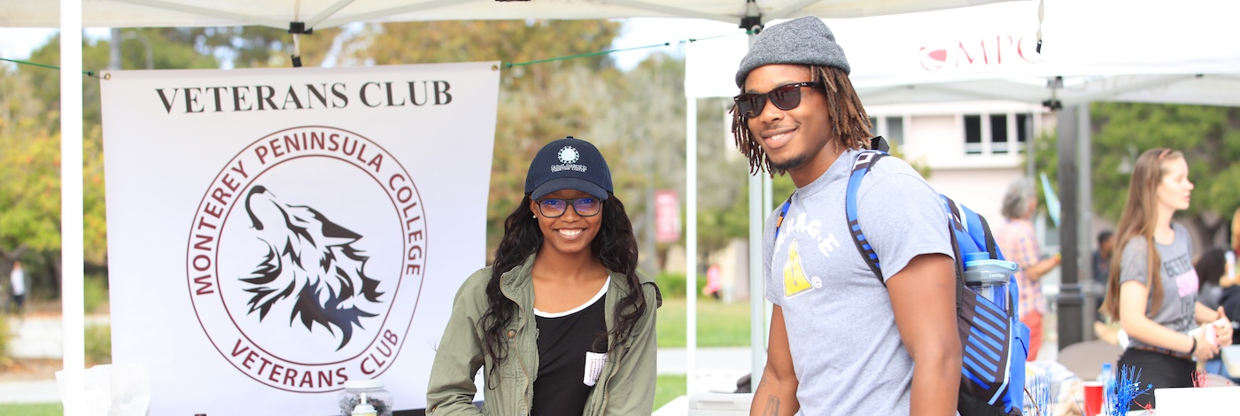 Student at Veterans Club Booth