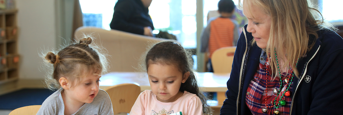 Little Lobos Academy Students with Instructor