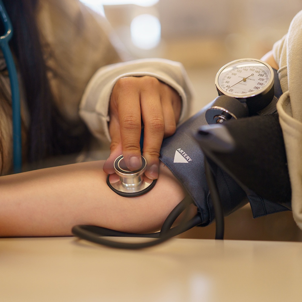 Student getting blood pressure read