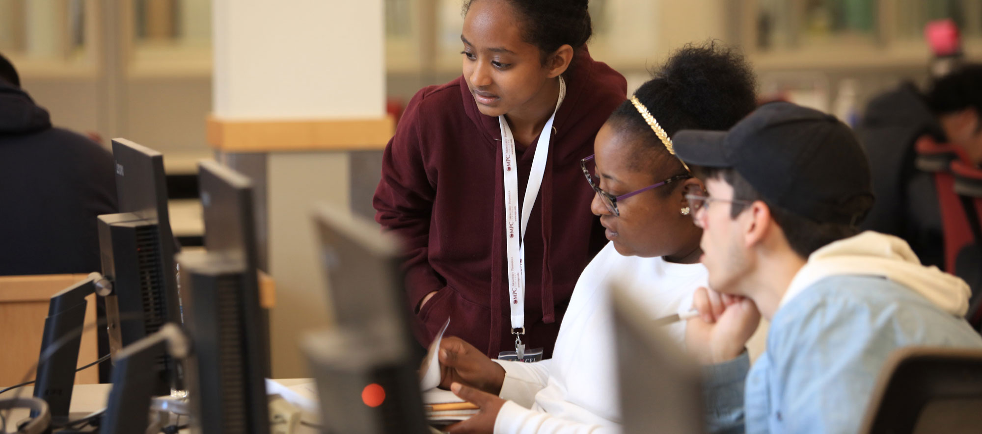 Students being tutored in STEM Center